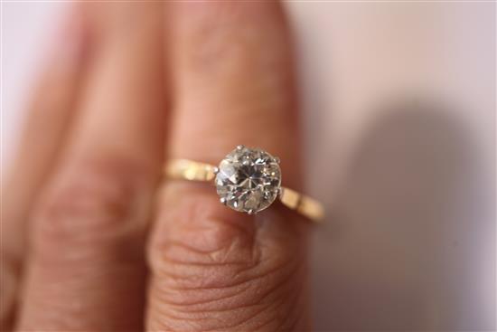 A 18ct and platinum solitaire diamond ring, size Q.